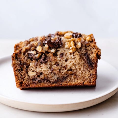 Deliciously moist slices of homemade banana bread, ideal for a sweet snack any time.